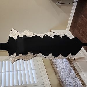 Ladies black dress with lace detail